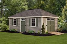 Deluxe Villa 12′ x 20′ • Clay vinyl siding, Navajo white trim, avocado green doors and shutters, slate architectural shingles. Options • Larger windows, shutters, extra side door, transom windows, ridge vent