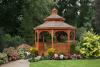 12′ Octagon • Double roof, Queen Anne railings and braces, redwood stain, slate shingles.