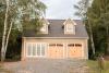 Custom Elite Garage with Hardi Siding and Cedar Carriage House Garage Doors